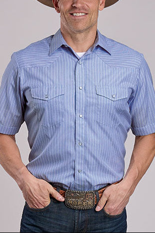 Man wearing a blue striped shirt, brown cowboy hat, and jeans on a gray background Shop at boltranchstore.com free shipping