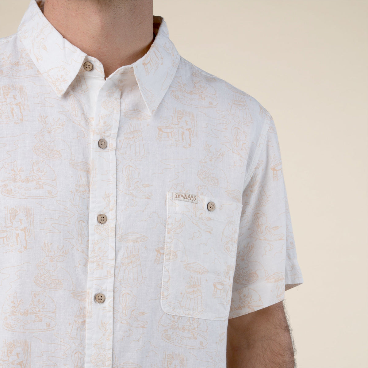 Sendero City Slicker Button Up Short Sleeve Mythical Critters Cream button up shirt for city days street tacos and dinner out Park City