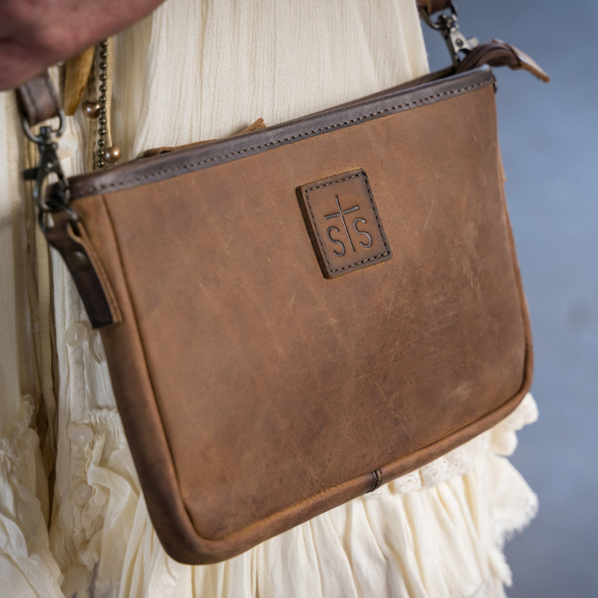 STS Ranch Baroness Claire Crossbody zip closure finished with a stamped STS zipper pull womens accessories