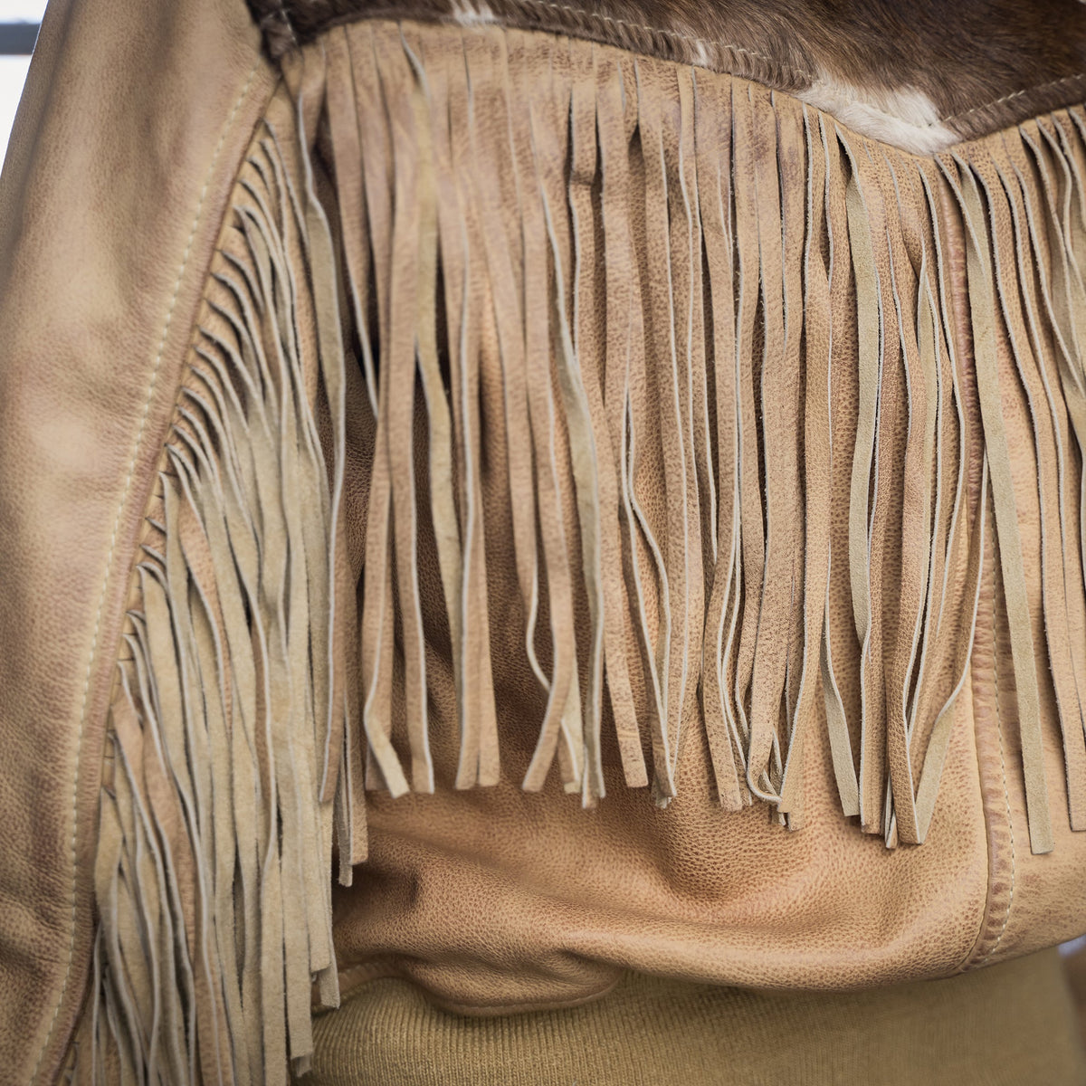 STS Ranch Womens Lettie Palomino fringe accents swinging below genuine cowhide detail womens western clothing