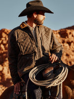 Schaefer Rangewax Blacktail Quilted Jacket a 6 front pockets, trimmed with solid brass hardware corduroy collar available worn in Yellowstone at boltranchstore.com