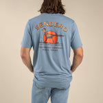 Sendero Desert Runner T Shirt at boltranchstore.com free shipping mens tee shirt summer shirt Person wearing a blue t-shirt with 'Sendero' branding on the back