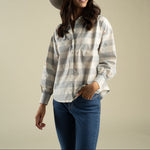 Sendero Womens Helena Button Down at boltranchstore.com in stock free shipping A woman modeling a light gray and white striped long-sleeve button-up shirt  womens button down with flowers 