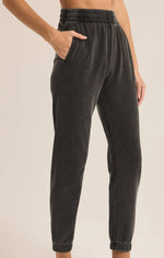Person wearing black jogger pants 