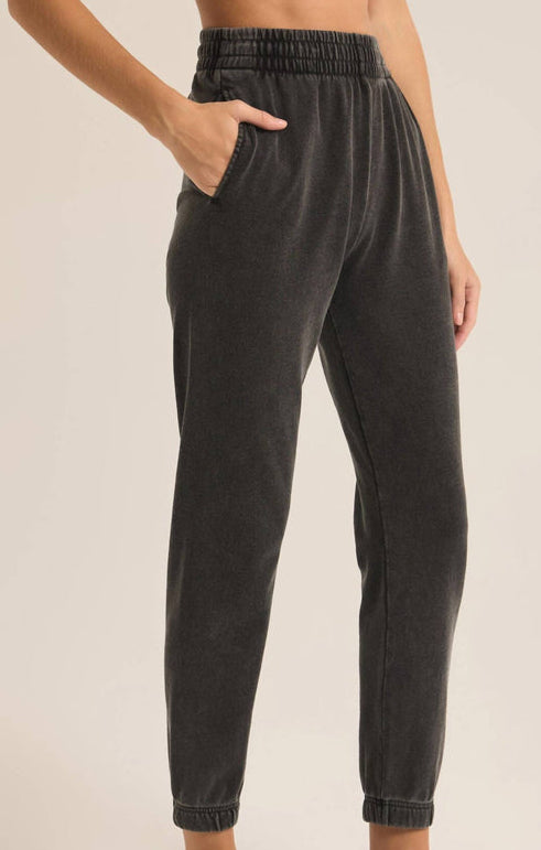 Person wearing black jogger pants 