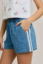 Sophie Lace Trim Denim Shorts womens denim elastic waist summer shorts with lace trim side cute casual trendy teen womens at Boltranchstore.com Le Lis