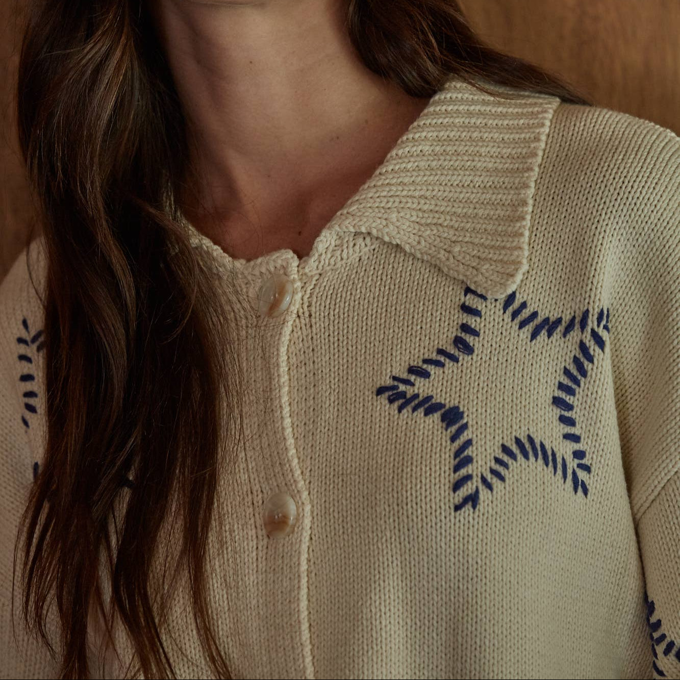 Starry Knit Sweater Cardigan cream-colored knit cardigan sweater with a pointed collar and dark blue star embroidery bolt ranch store