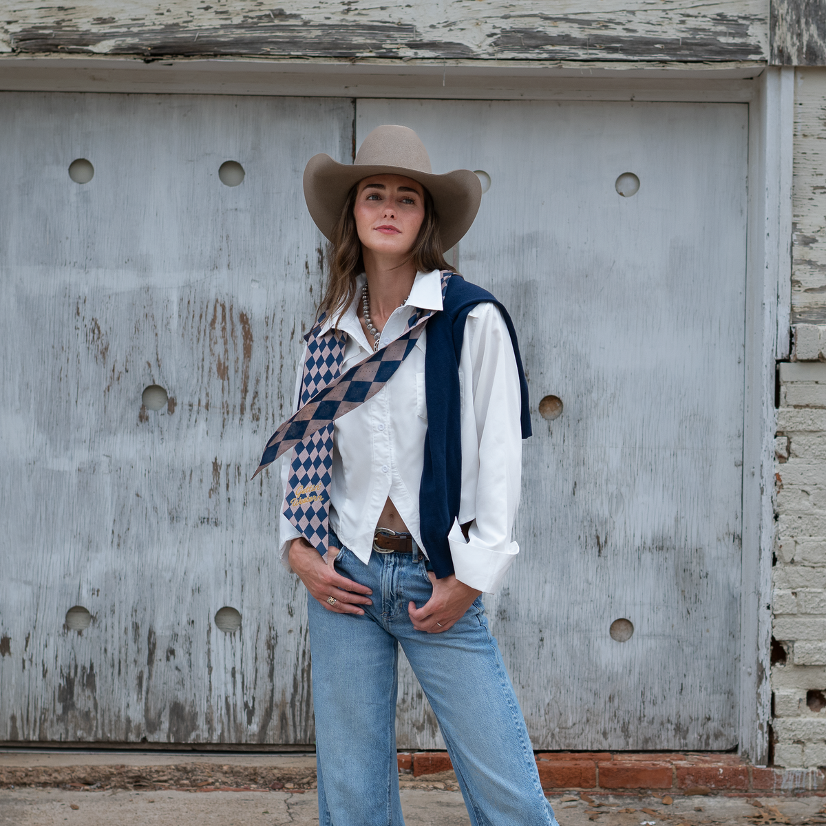Fringe Scarves Boli Gettin Western Navy Plaid tied on a handbag as a bag accent Kamas