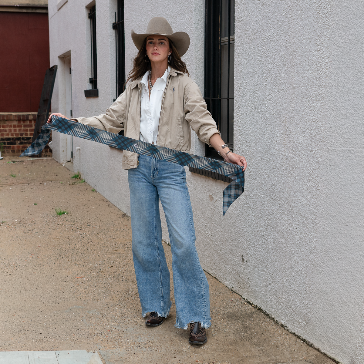 Fringe Scarves Boli Gettin Western Navy Plaid looped through belt loops as a western belt ranch wear
