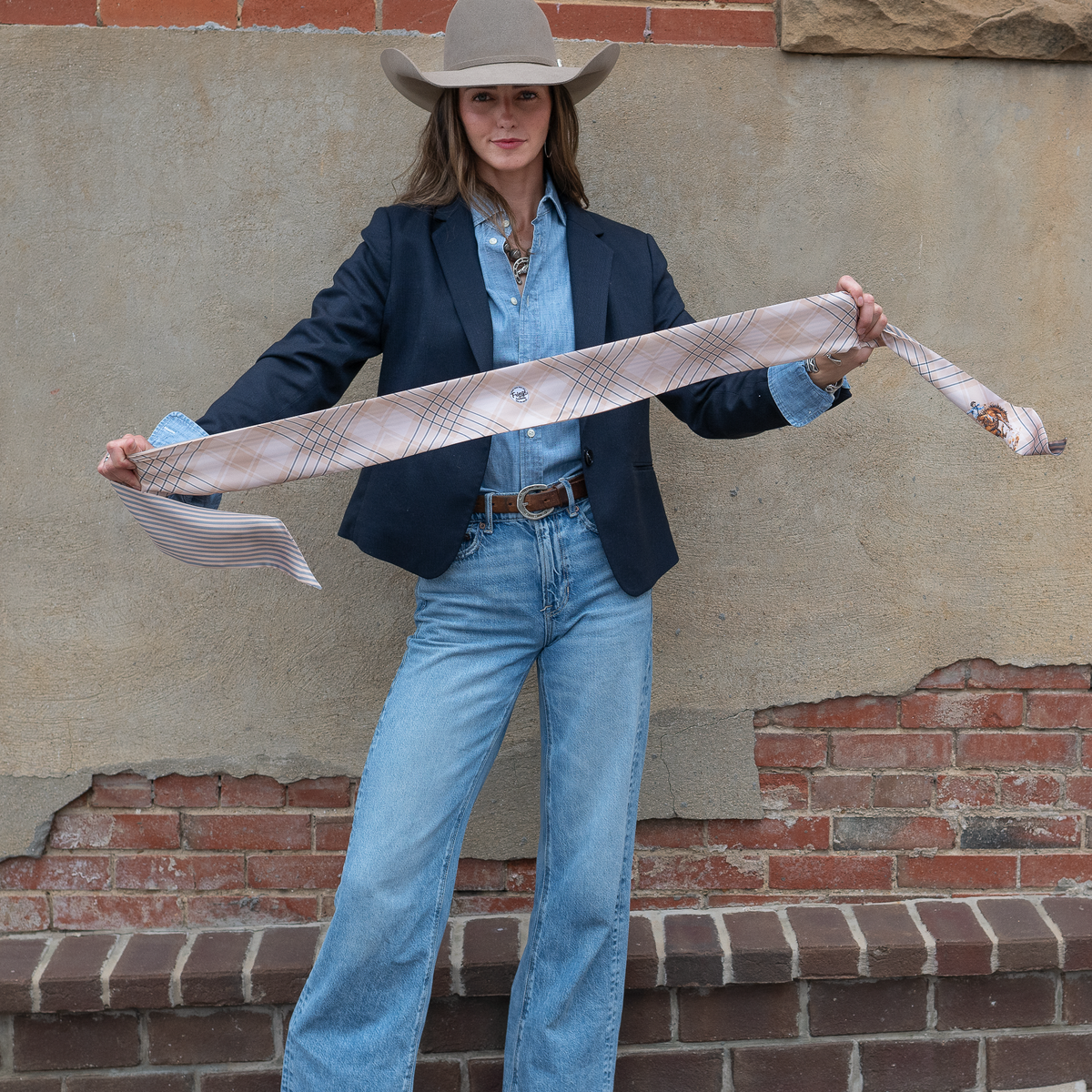 Fringe Scarves Boli Gettin Western Tan Blue Plaid tied as an oversized bow at the collar western fashion