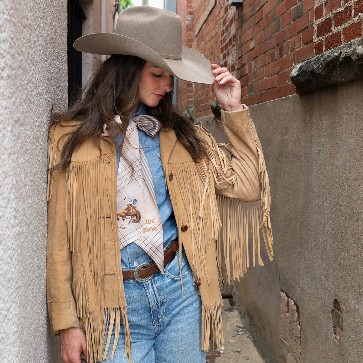 Fringe Scarves Boli Gettin Western Tan Blue Plaid wrapped around a cowboy hat as a hatband Park City