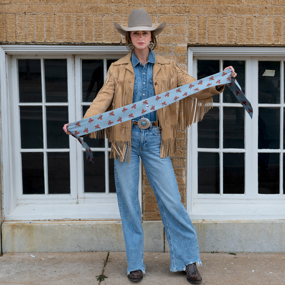 Fringe Scarves Boli Preppy Saddle Blue Brown wrapped around a cowboy hat as a hatband Park City