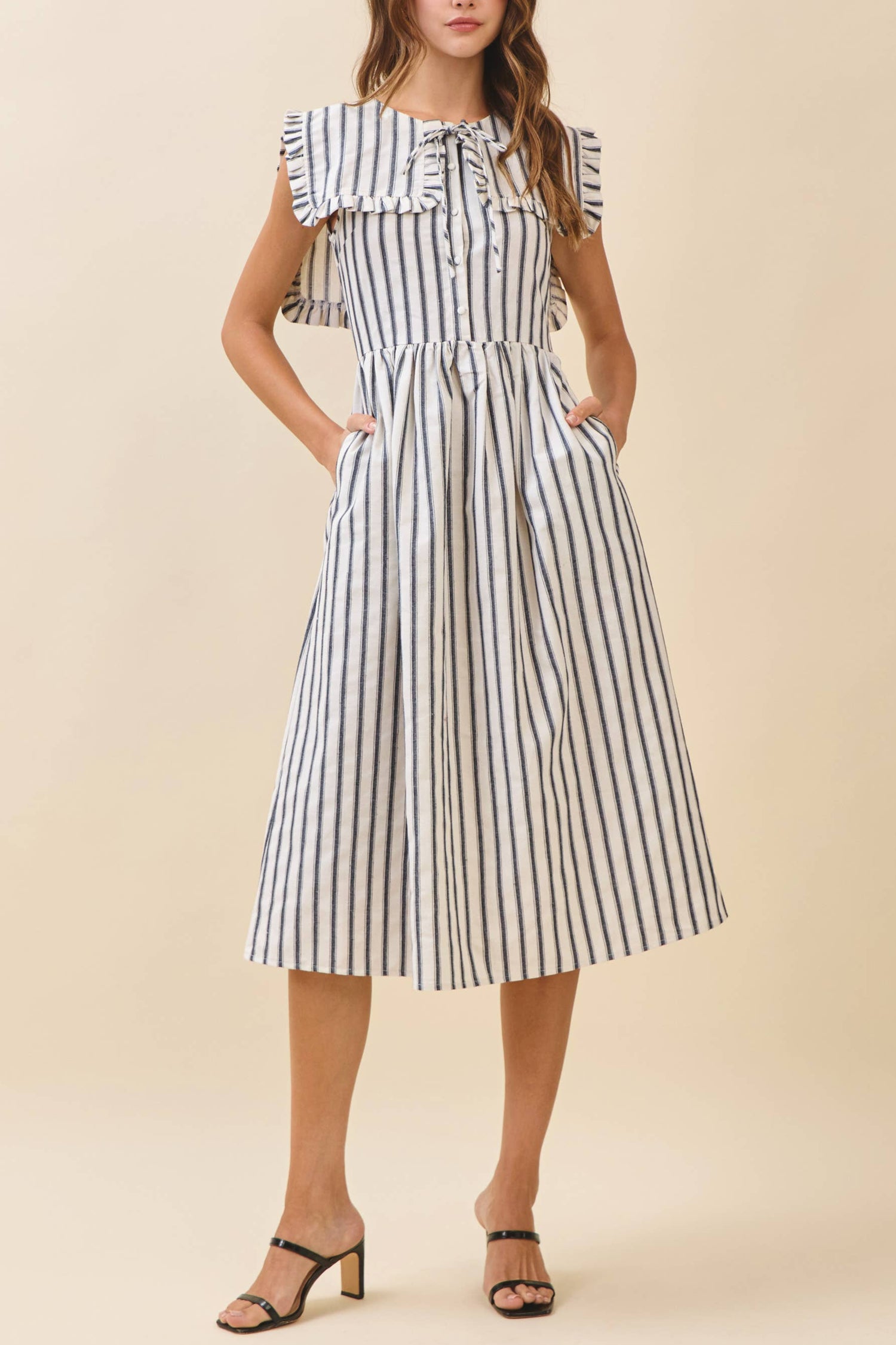Striped midi dress featuring a ruffled square collar with front tie, a fitted waist, and a flared skirt Boltranchstore.com womens dress
