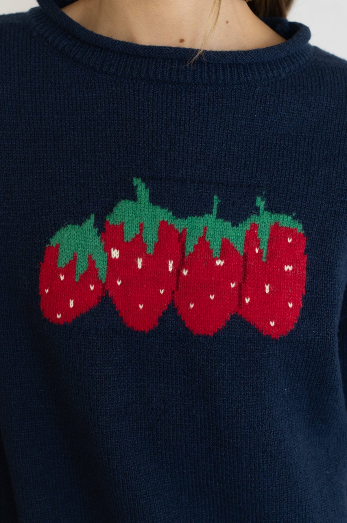Things Between Strawberry Sweater intarsia inspired strawberry knit motif for playful fall outfits cowgirl Park City