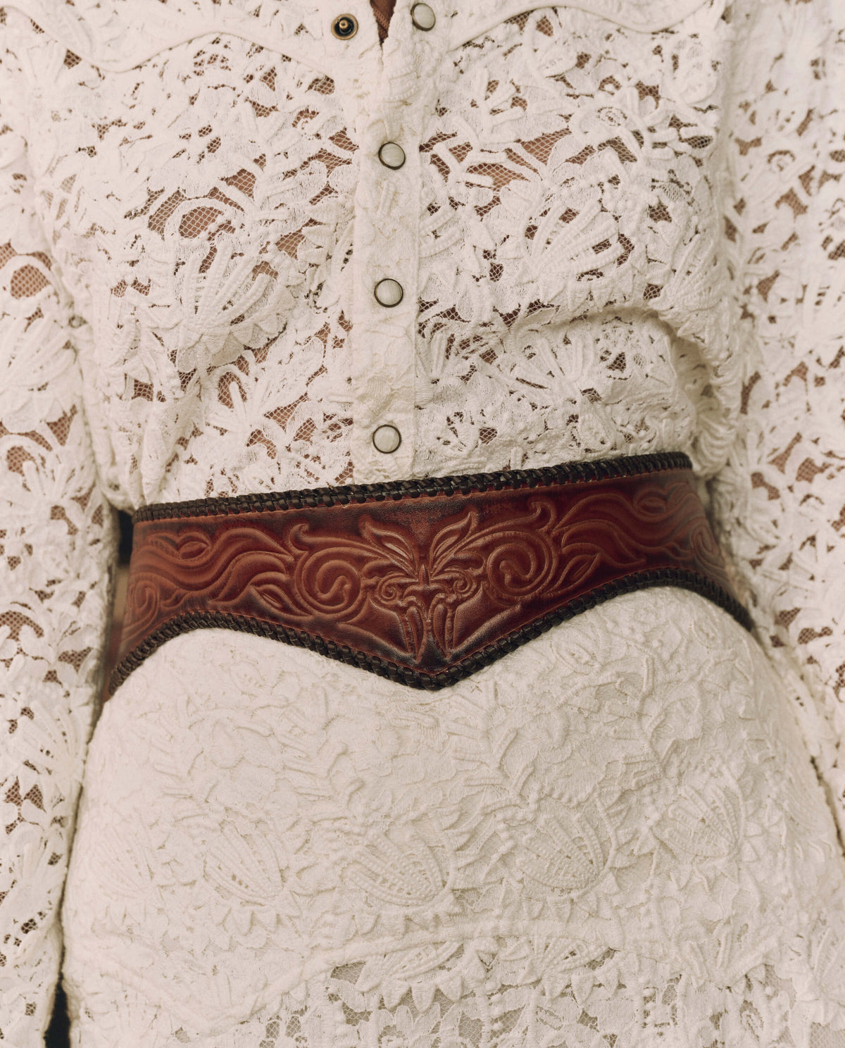 Stetson x THE GREAT Tooled Corset Belt Burnished Brown wide cinched waist shape over a lace dress western clothing