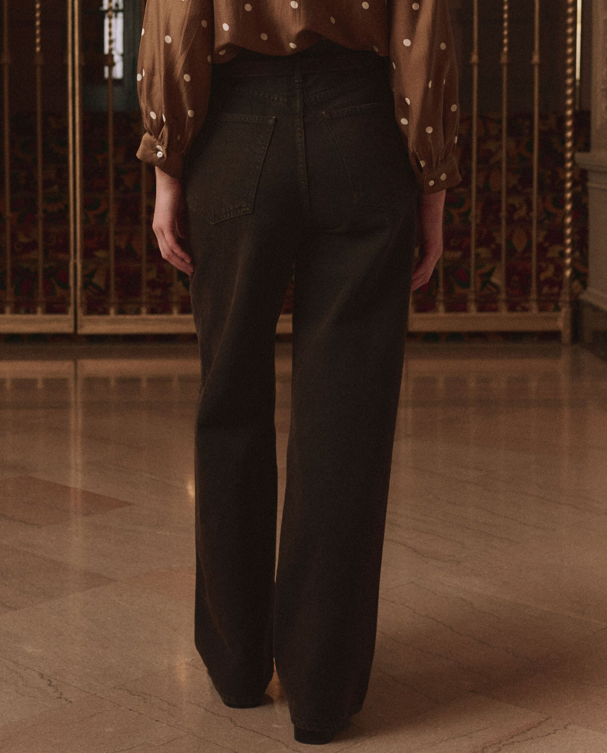 The Great Ford Jean Tarnished Brown styled with a copper dot silk blouse for western fashion