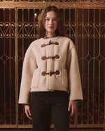 The Great Woodside Toggle Coat Cream suede loop and toggle hardware down the front placket