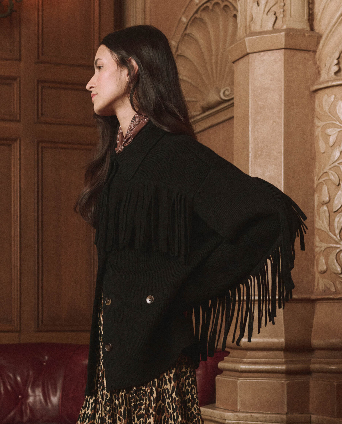 The Great Western Fringe Sweater Jacket Black styled with a leopard midi skirt for rodeo nights