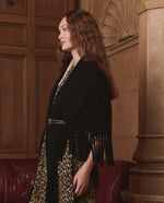The Great Big Sweater Fringe Scarf Black tassel trim swinging along the bias edge Park City winter