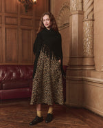 The Great Big Sweater Fringe Scarf Black sweater knit shawl draped over the shoulders cowgirl layering