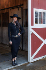 black long-sleeve Dress Style with a  buckle and layered silver necklaces and black and with ankle boots Tasha Polizzi Zyaire Dress Black in stock at bolt ranch store in kamas utah western dress 