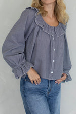 Teagan Gingham Blouse a button up ruffle collar long sleeve and ruffle cuff available at boltranchstore.com