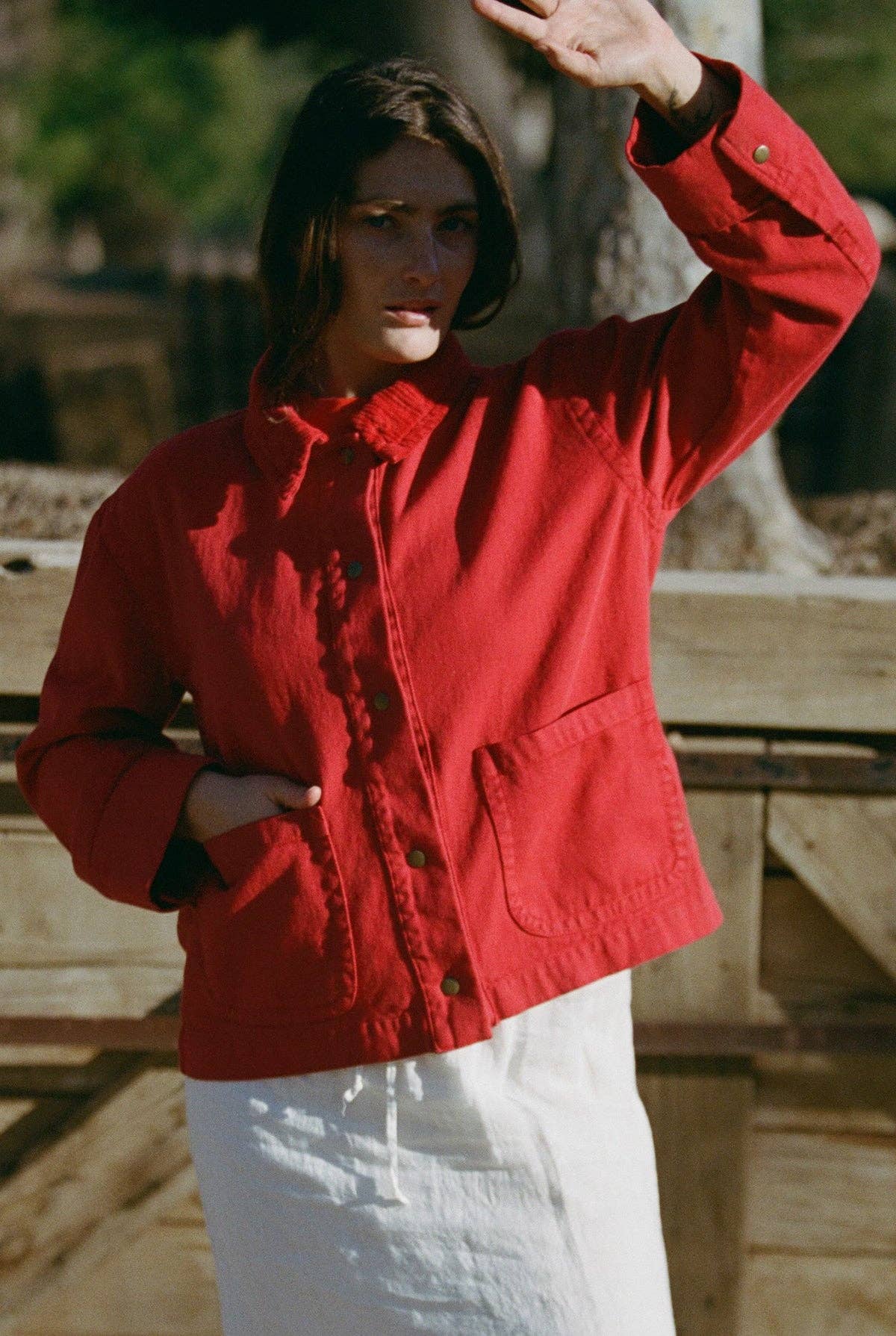 The Ramona Jacket In Red a full button up with front pockets and collar a denim weave for wrangler jeans and ariat boots at boltranchstore.com