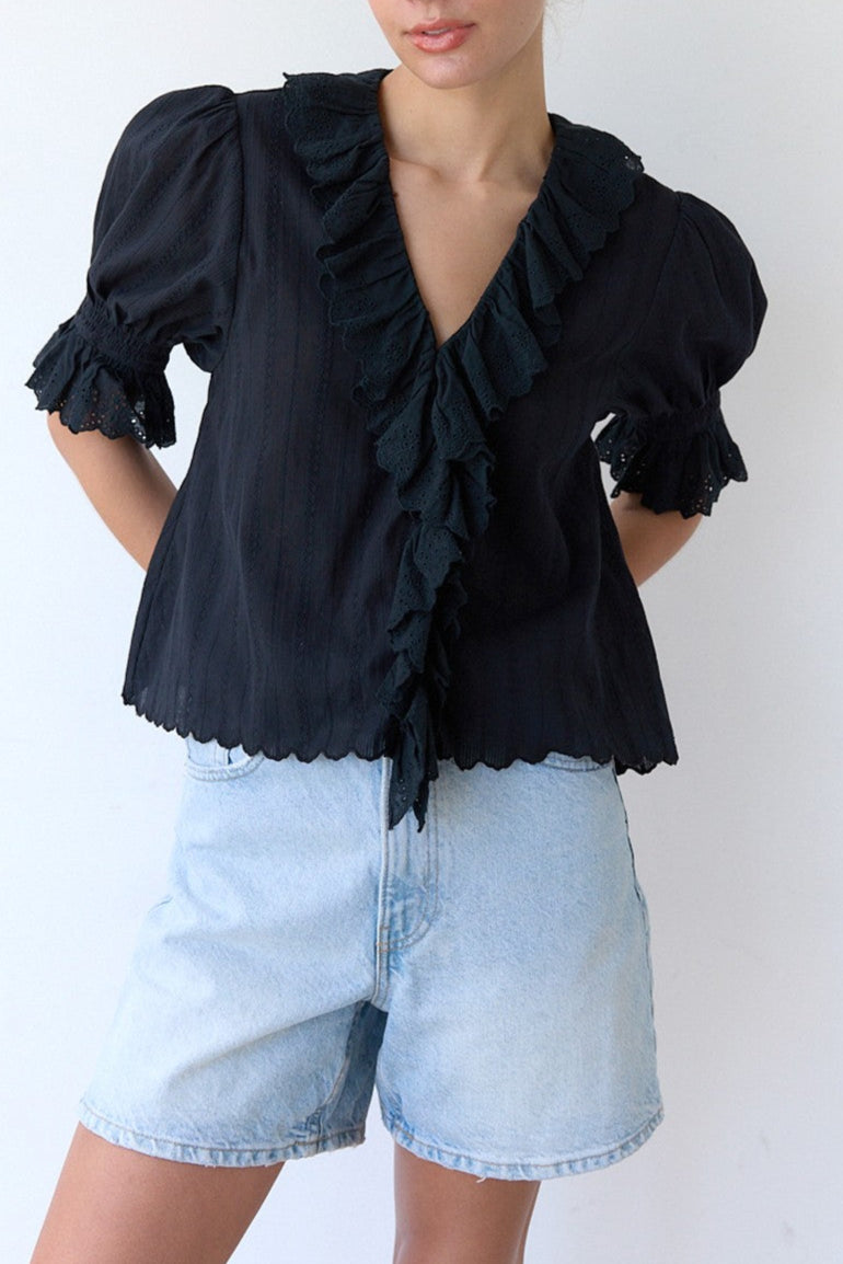 Vera V Neck Ruffle Blouse featuring ruffle sleeves button up front with puff sleeves and ruffle bottom at boltranchstore.com