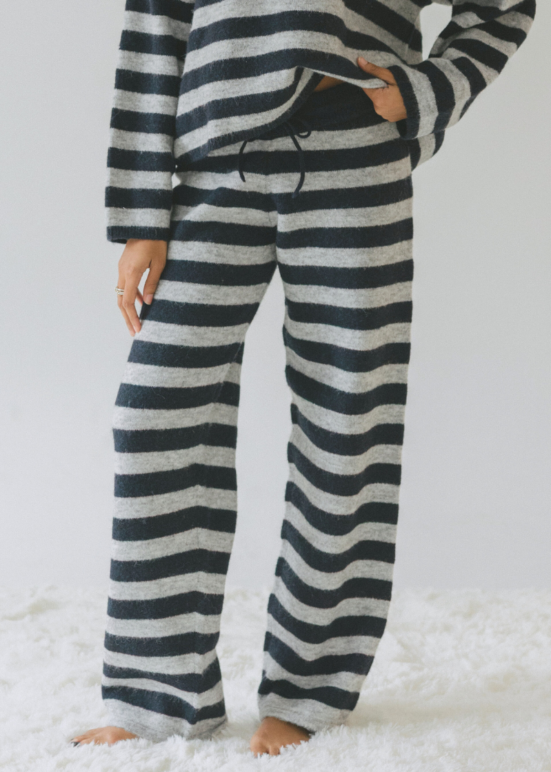 Veronica Striped Knit Pants in a heather navy and black horizontal stripes with a black waistband and tie