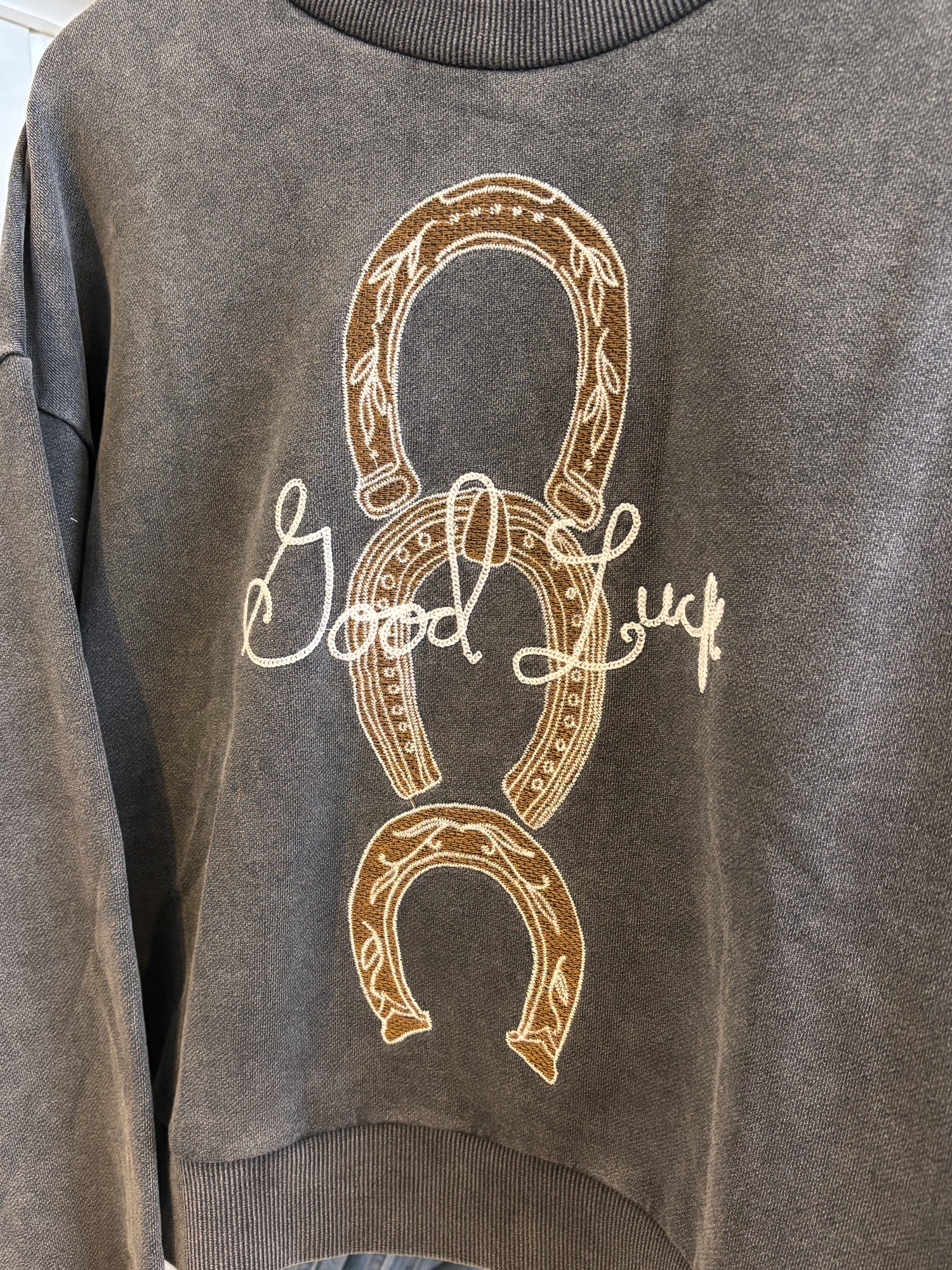 Womens Western Horseshoe Crewneck by Blue B sold at Bolt Ranch Store gray acid wash sweatshirt with embroidered horseshoes and good luck