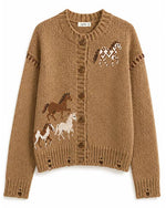 Wild Horses Intarsia Cardigan a button up cardigan with a woven horse on left shoulder and 3 horses on bottom right and long sleeves
