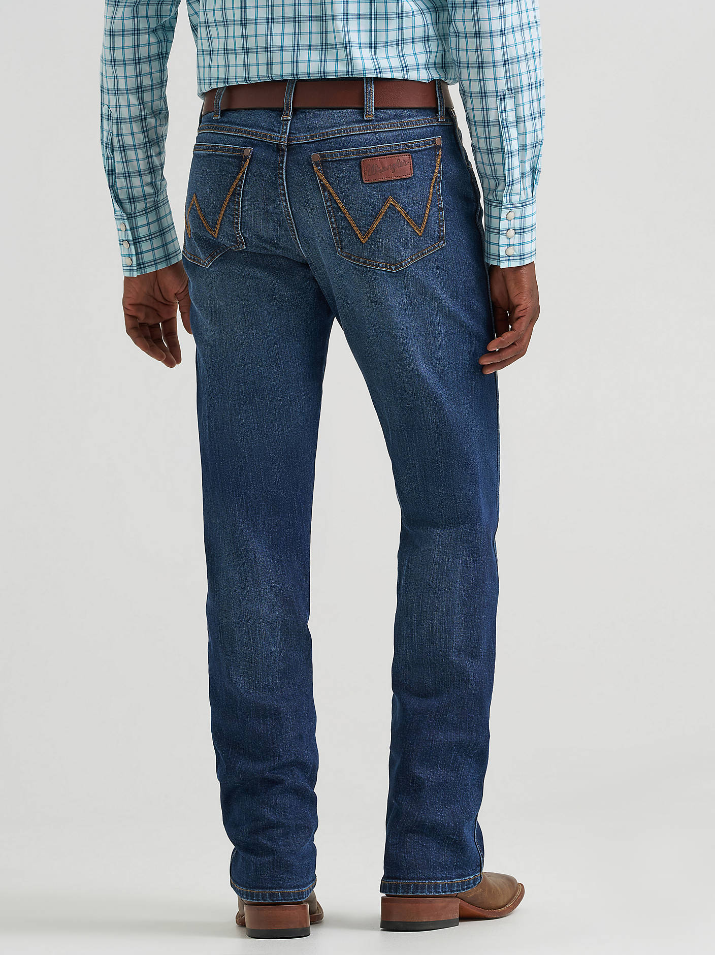 Wrangler Mens Retro Slim Straight in Stanton a medium wash with some stretch denim a perfect jean for the saddle great for horse riding western jean at boltranchstore.com