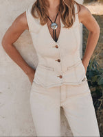 Wrangler women's denim vest with button-down front and angled hem with front pockets and sleeveless a perfect match for the Wrangler jeans 