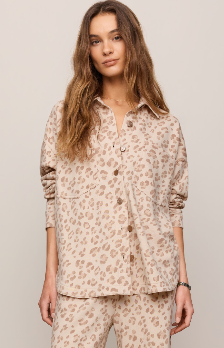 Z Supply All Day Knit Leopard Jacket shop at boltranchstore.com Woman wearing a beige patterned shirt and pants against a plain background