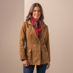 Madison Creek Outfitters Albany Field Jacket layered with a red scarf for fall ranch wear and womens western fashion