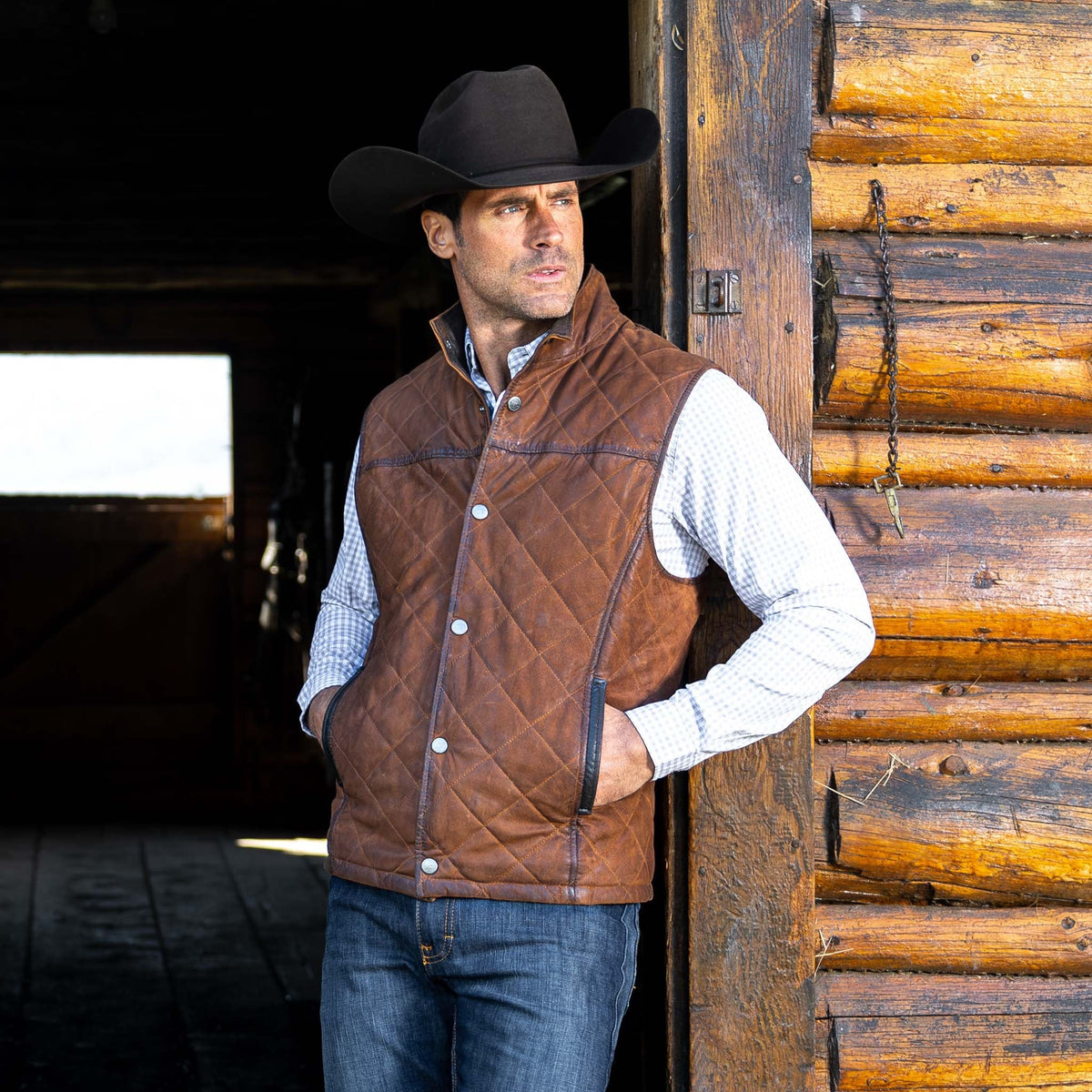Madison Creek Outfitters Beaver Creek Waxed Goat Suede Leather Vest Bourbon diamond quilted body showing natural weathered markings across the suede ranch wear