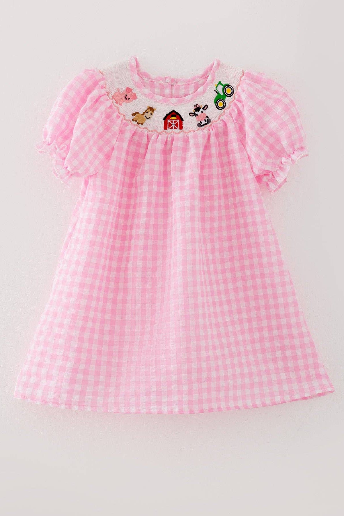 Pink checkered dress with embroidered details on a light gray background farm embroidered boltranchstore.com