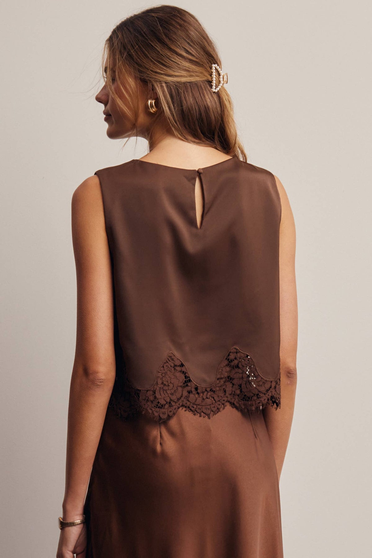 Listicle Satin Lace Hem Sleeveless Top Mocha smooth back panel with lace trim along the hem for a rodeo night out
