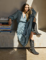 Penelope Chilvers Goldie Paloma Suede Boot styled with a blue dress for western fashion