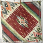Fringe Topsy Silk Scarf Mexican saddle blanket print with two different opposing corners and silver naja accents womens western boutique Utah SKU SCRFTOPS0444