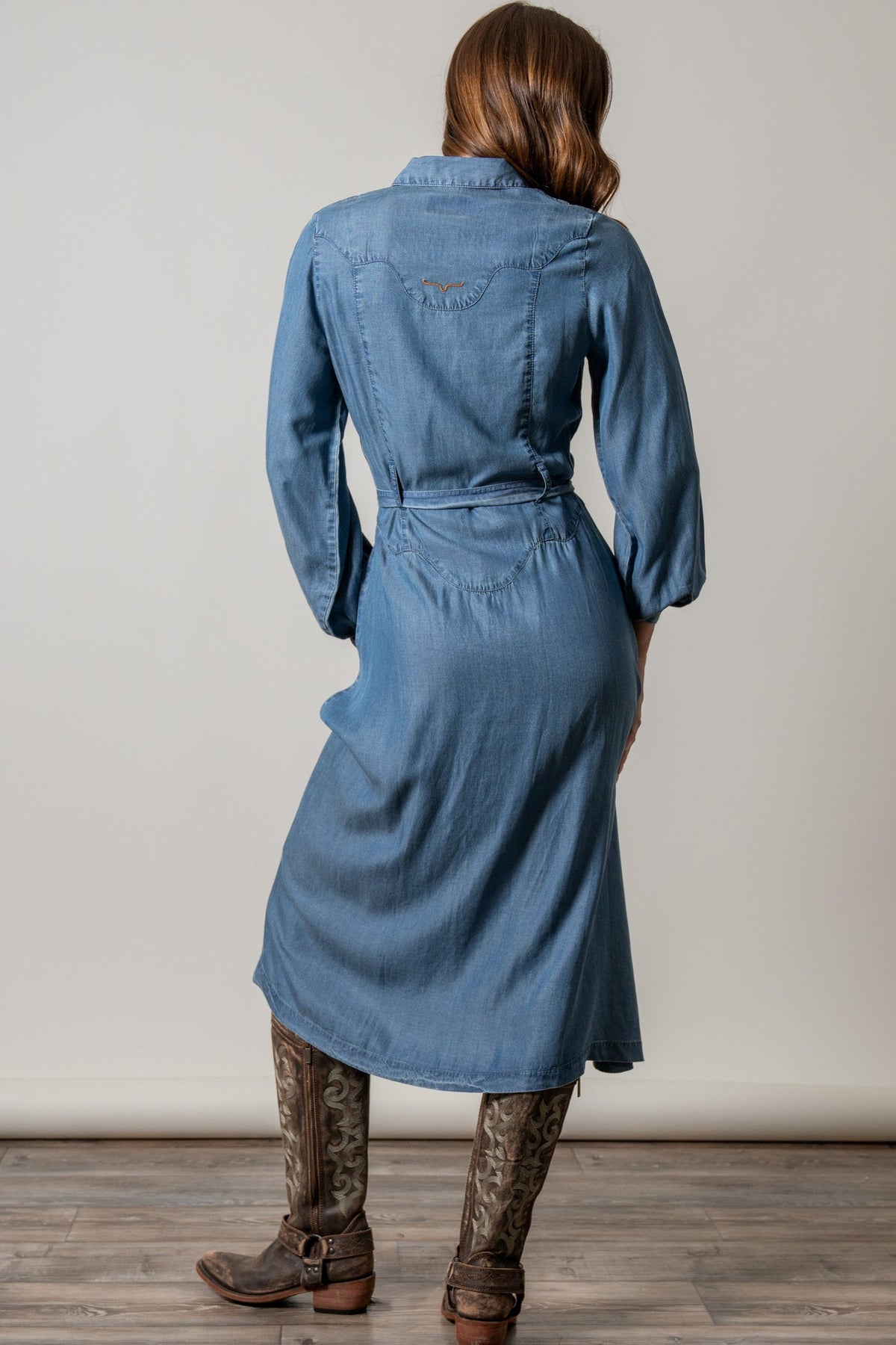Kimes Ranch Womens Channy Indigo flowing midi skirt with a button through front worn with boots cowgirl style
