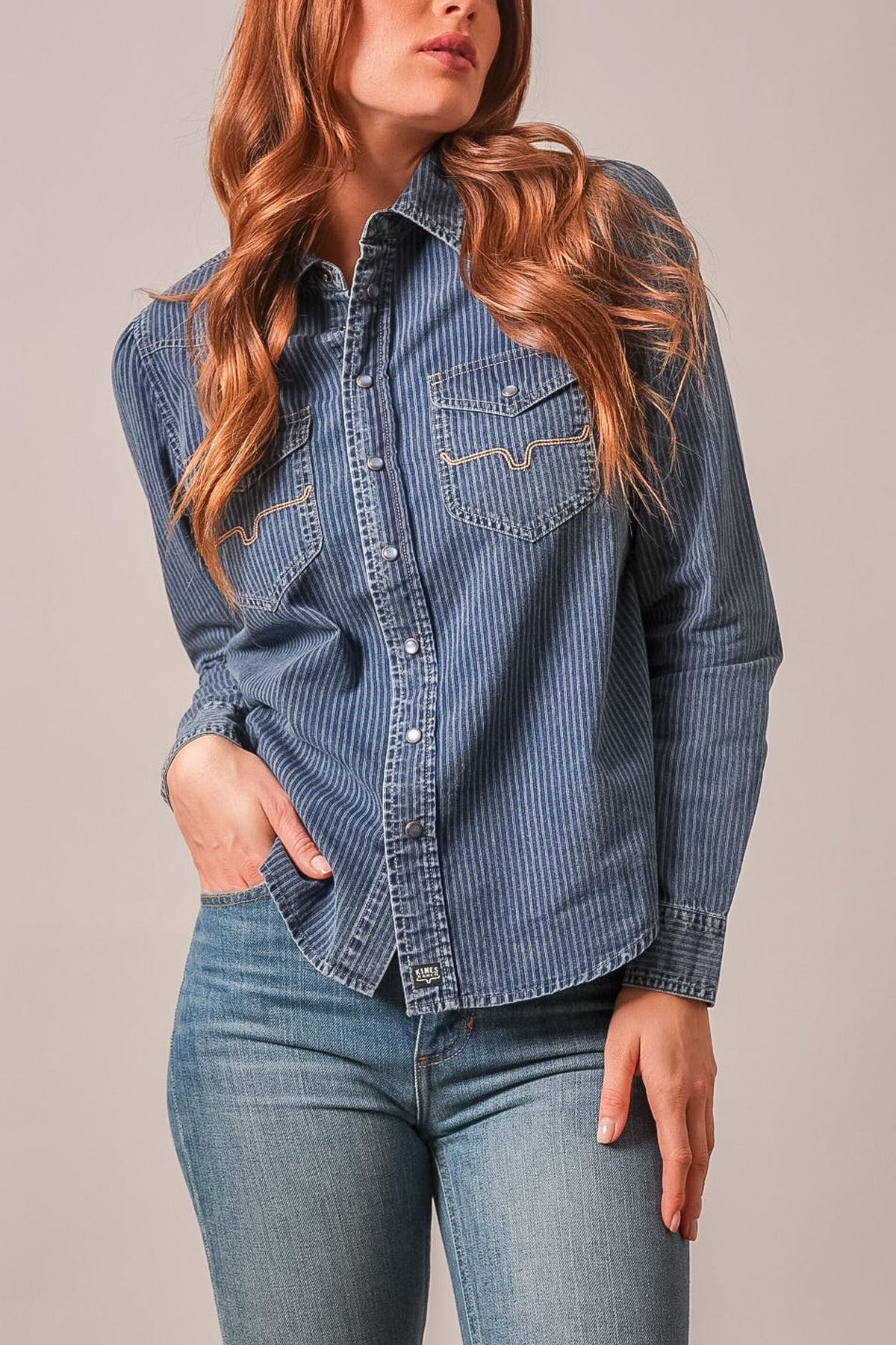 Kimes Ranch Womens Frankie Indigo Stripe striped denim western snap shirt with pearl snaps and chest pockets womens western boutique Utah SKU WTO0000092-BL021