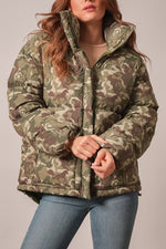 Kimes Ranch Womens Letty Camo olive and tan camouflage puffer jacket with high stand collar and zip front womens western boutique Utah SKU
WJA0000016-GN010