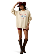 Ariat Womens Oversize Sweatshirt Parchment cozy layer styled with cowboy boots and a felt hat for fall rodeo days in Park City