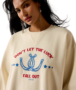 Ariat Womens Oversize Sweatshirt Parchment crossed horseshoe screen print with stars and embroidery detail across the chest western clothing