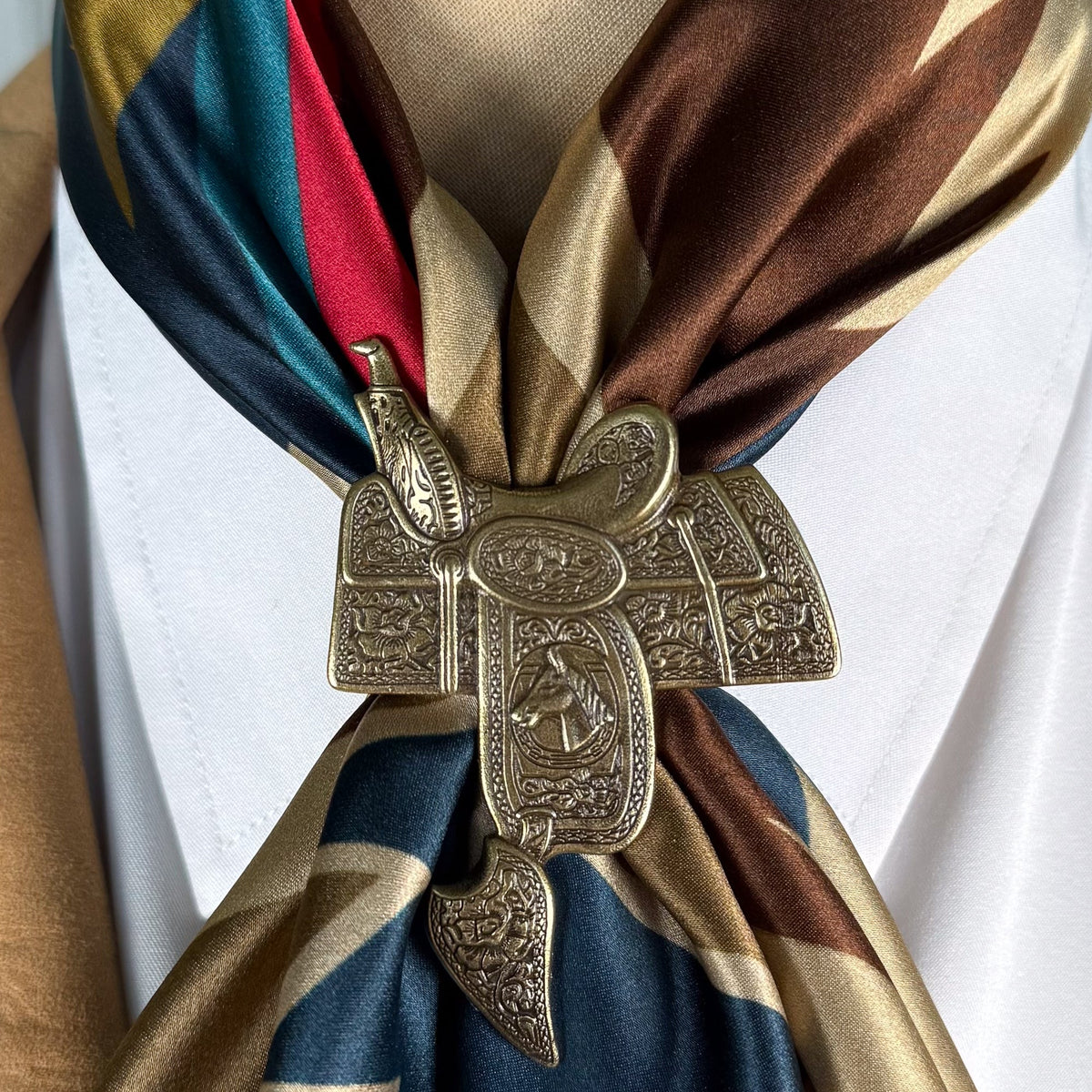 Fringe Slide Parade Saddle Gold artisan brass with an antiqued patina in gold western clothing