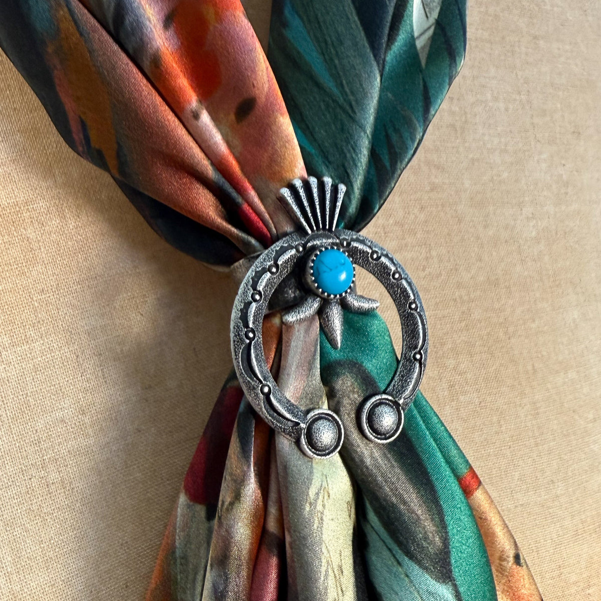 Fringe Slide Naja naja shape in antiqued silver with a turquoise colored stone womens western boutique Utah SKU SLDENAJA26129