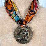 Fringe Slide Harnessed Lucky Horse horse brass style medallion with a horseshoe framed horse and split top opening womens western boutique Utah SKU SLDEHRNLH26117