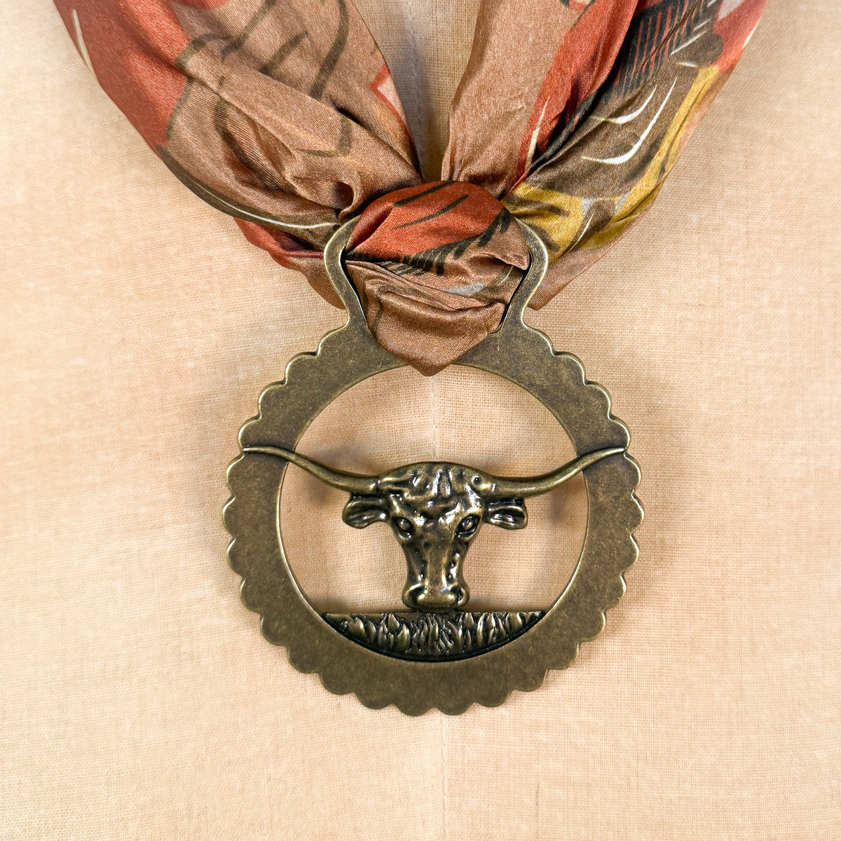 Fringe Slide Harnessed Longhorn horse brass style medallion with a longhorn and split top opening womens western boutique Utah SKU SLDEHRNLH26119