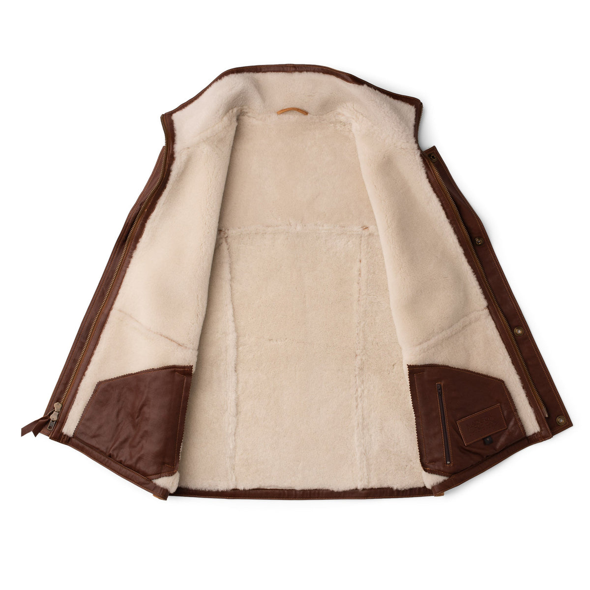 Madison Creek Outfitters Pitkin Sheepskin Vest Tan plush Merino wool fleece interior with zippered and patch pockets